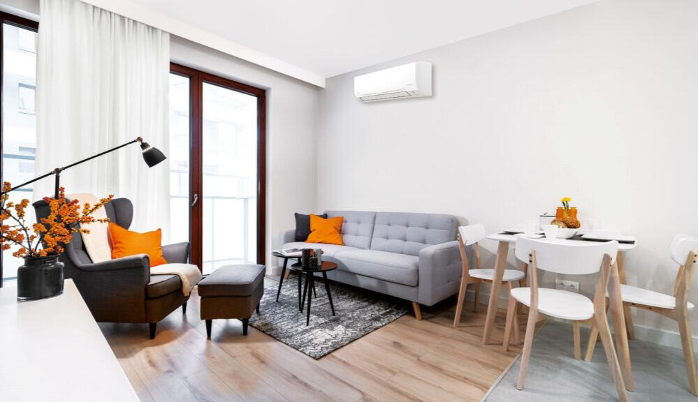 Split System Air Conditioner Adelaide A modern living room with a sleek split system air conditioner in Adelaide, providing efficient cooling and heating for year-round comfort.